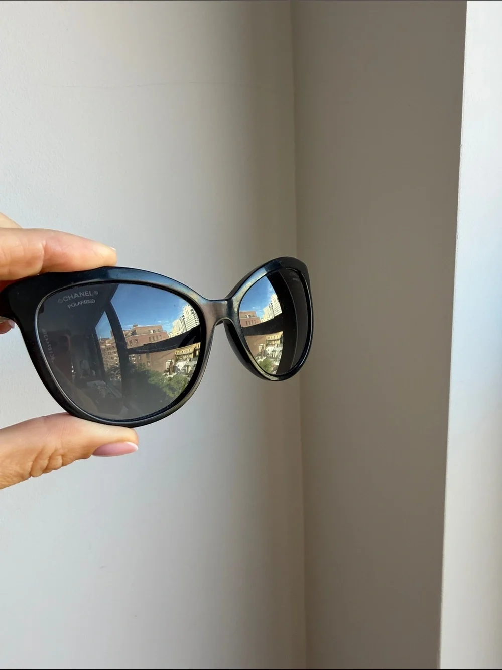 CHANEL Black Cat-Eye Sunglasses with Silver Accents